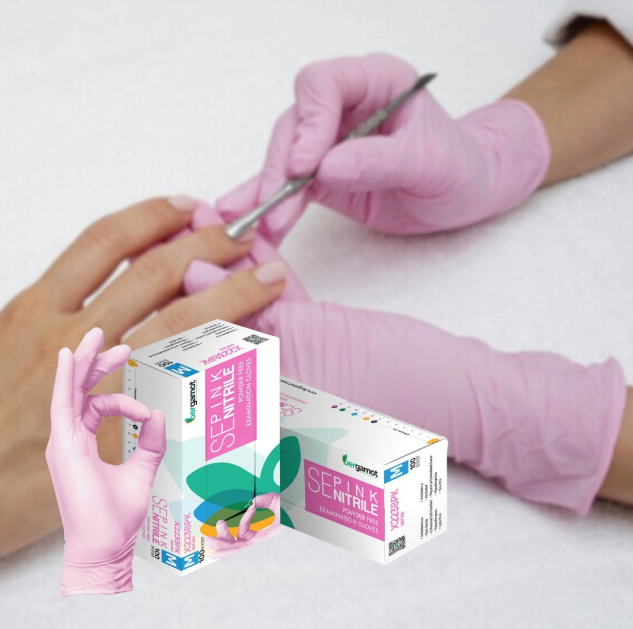 Pink nitrile gloves for nail technicians, providing superior protection and comfort during manicures and pedicures. Latex-free and durable, these gloves ensure excellent grip and tactile sensitivity for precise application.