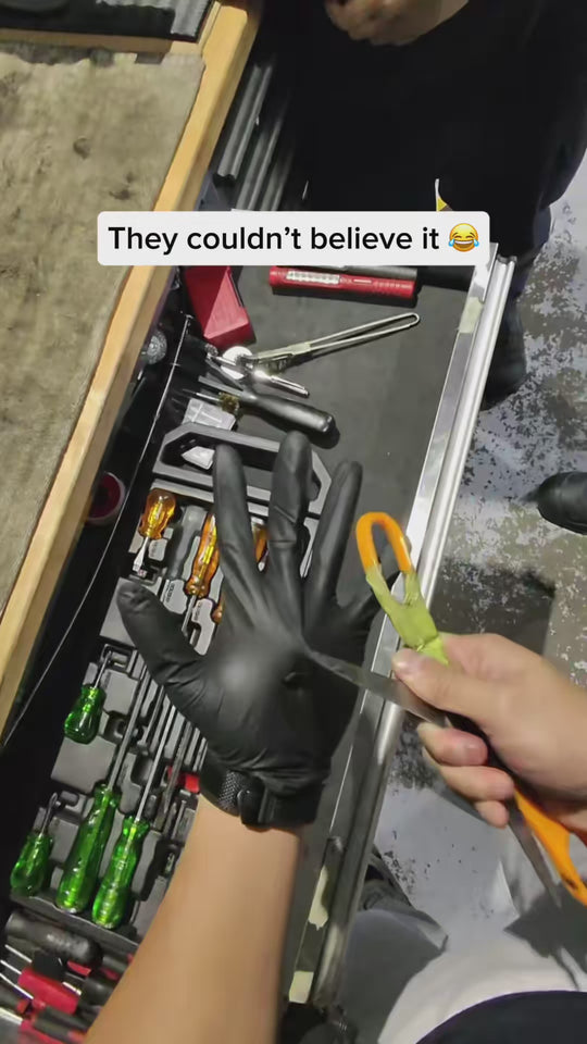 Grip-X gloves worn by a mechanic
