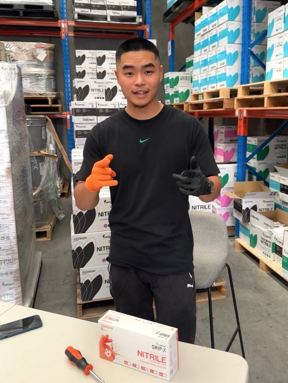 The HygieneHub founder in the Melbourne warehouse